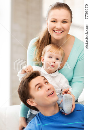 happy parents playing with adorable baby happy parents playing with adorable baby 7756970