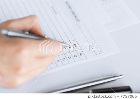 woman hand with blank questionnaire or form woman hand with blank questionnaire or form 7757066