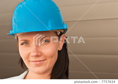 Portrait of  young engineer on construction site 7757634