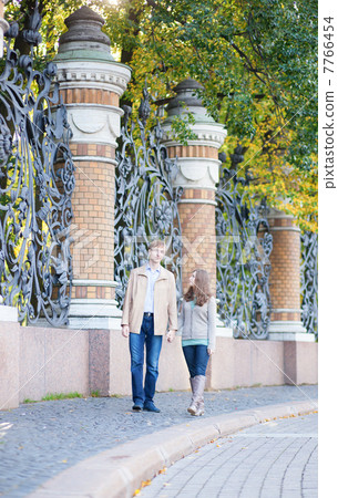 Couple walking in St.Petersburg, Russia 7766454