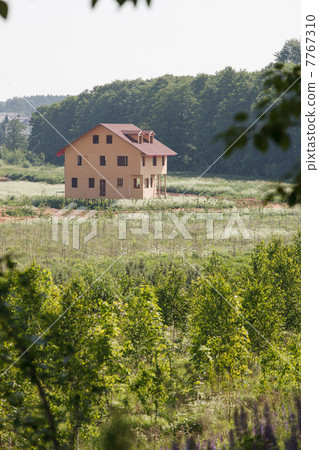 Unfinished wooden house 7767310