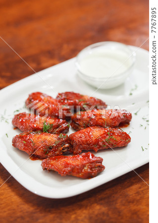 Chicken wings with sauce Chicken wings with sauce 7767895