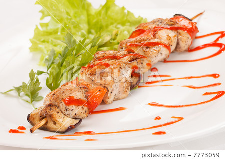 Chicken kebab with tomato sauce Chicken kebab with tomato sauce 7773059