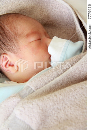 Newly born baby (sleeping face) 7779616