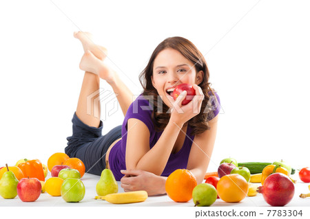 Healthy nutrition - young woman with fruits 7783304