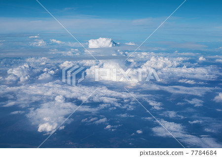 Coudy sky from a window of aircraft Coudy sky from a window of aircraft 7784684