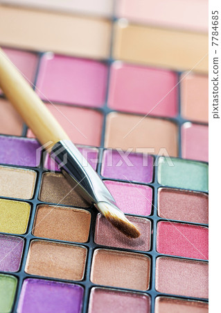 Eye shadows palette and brush. Vertical shot. Eye shadows palette and brush. Vertical shot. 7784685