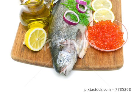 fish trout, salmon roe, vegetables and spices on a white backgro fish trout, salmon roe, vegetables and spices on a white backgro 7785268