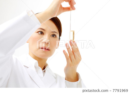 Researcher seeing test tube Researcher seeing test tube 7791969