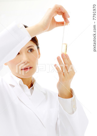 Researcher seeing test tube Researcher seeing test tube 7791970