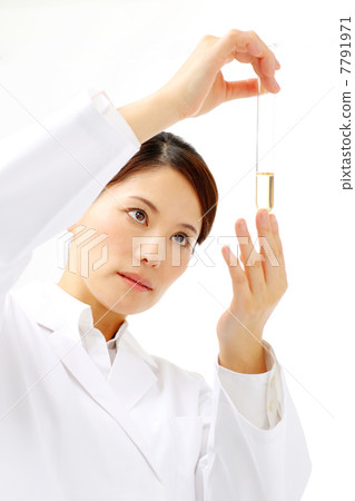 Researcher seeing test tube Researcher seeing test tube 7791971