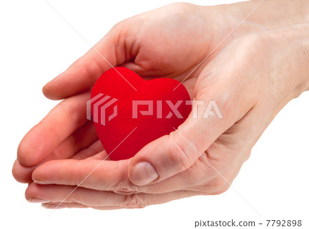 Heart symbol in woman hands. Heart symbol in woman hands. 7792898
