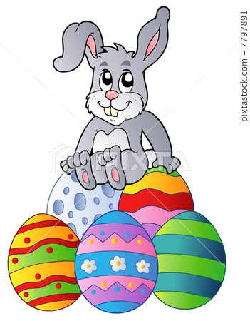 Bunny on pile of Easter eggs Bunny on pile of Easter eggs 7797891