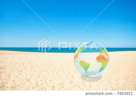 Earth Eco Image Rainbow-colored earth on a sandy beach 7803851