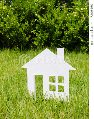 Paper house on the lawn 7806460