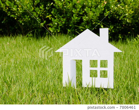 Paper house on the lawn 7806461