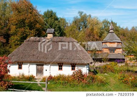 Old wooden house and a wooden Orthodox Church Old wooden house and a wooden Orthodox Church 7820359