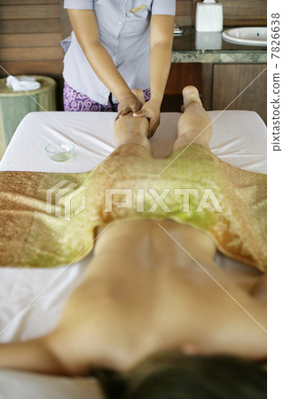 Woman receiving massage 7826638