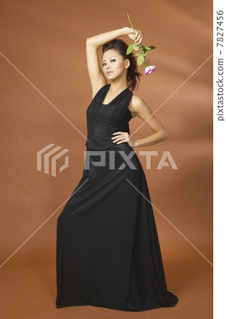 Young woman wearing evening dress Young woman wearing evening dress 7827456