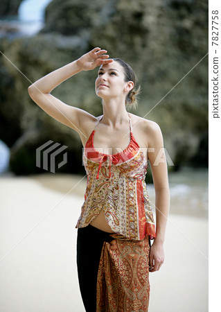 Young woman posing on the beach Young woman posing on the beach 7827758