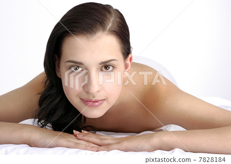 "Young woman lying on front,close up" 7828184