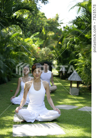 Young people practising yoga 7828578