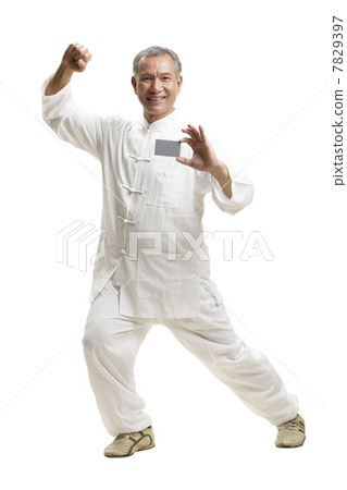 Portrait of senior man wearing Tai Chi clothes 7829397
