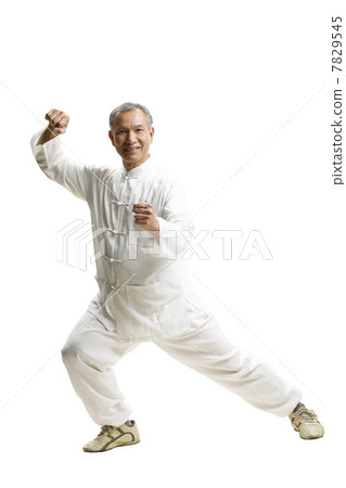 Portrait of senior man wearing Tai Chi clothes 7829545