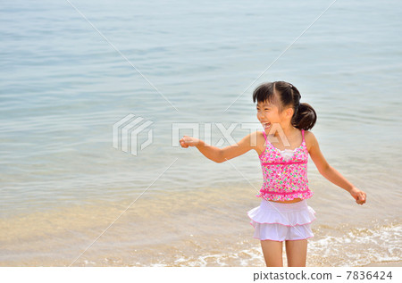 A girl who enjoys swimming 7836424