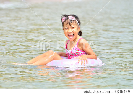 A girl who enjoys swimming A girl who enjoys swimming 7836429