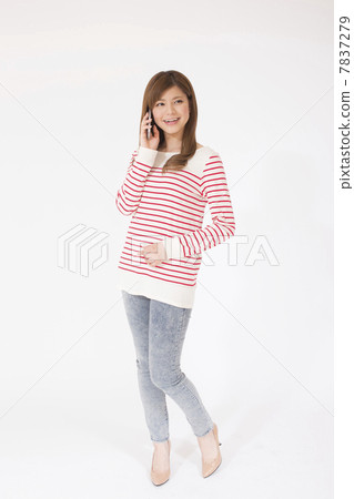 A young lady calling on a smartphone 7837279