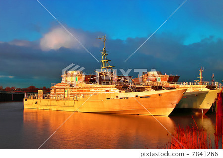 Marine sunset on the Dutch shipyard. New unpainted vessels in su Marine sunset on the Dutch shipyard. New unpainted vessels in su 7841266