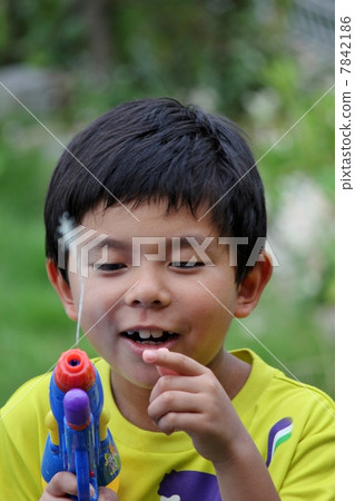 Children playing with water gun Children playing with water gun 7842186