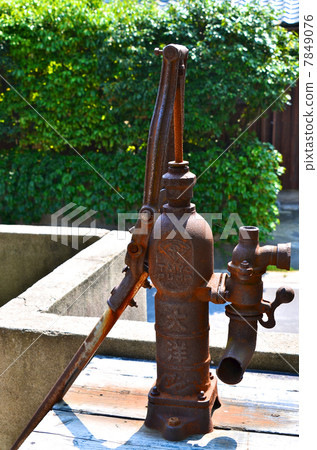 Scenery with a well 7849076