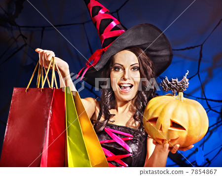 Woman holding Halloween shopping bag. Woman holding Halloween shopping bag. 7854867