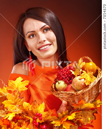 Woman holding autumn basket. Woman holding autumn basket. 7854870