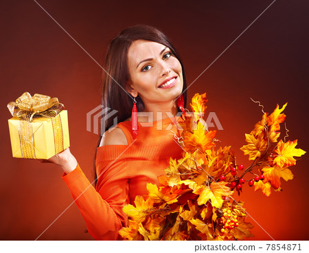 Woman holding gift box. 7854871