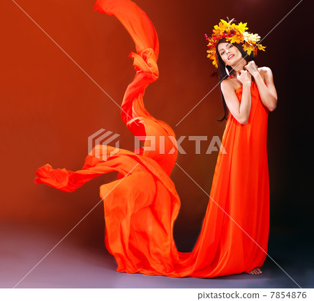 Girl with a wreath of autumn leaves on the head. Girl with a wreath of autumn leaves on the head. 7854876