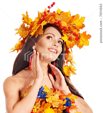 Girl with a wreath of autumn leaves on the head. 7854883