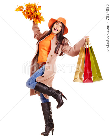 Woman holding orange leaves. Woman holding orange leaves. 7854886