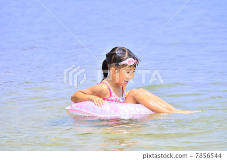 A girl who enjoys swimming A girl who enjoys swimming 7856544