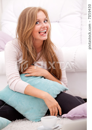 Woman holding pillow Woman holding pillow 7859430