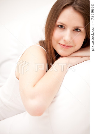 woman lying on a sofa woman lying on a sofa 7859698