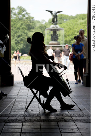 A woman playing cello A woman playing cello 7862415