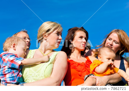 Family and multi-generation - fun on meadow in summer 7862721