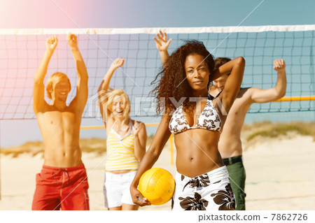 Friends playing Beach volleyball 7862726