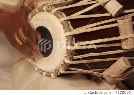 Man playing the tabla Man playing the tabla 7870095