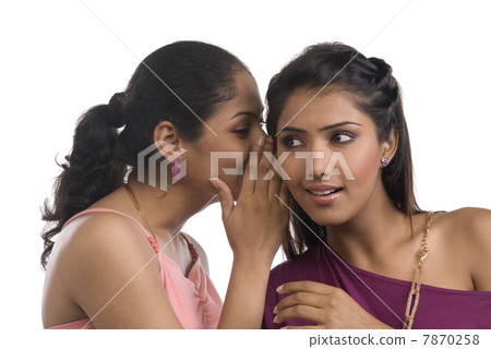 Women whispering  7870258