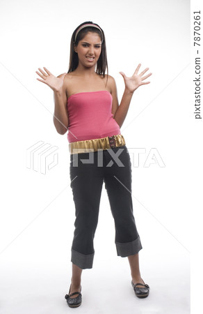 Woman making a hand gesture  7870261