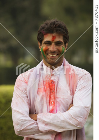 Man posing during Holi  7870415